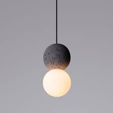Purchase canvas prints, framed prints, tapestries, posters, greeting cards, and more. Davidpompa S Origo Light Contrasts Rough Volcanic Rock And Glass Bulbs