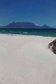 Dolphin Beach In Tableview Cape Town South Africa The Beach Has A Great View Of Table Mountain Visit South Africa Africa Travel Africa Holiday