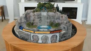 The size is 33 x 72 and very large. Coffee Table Railroad Flips To Hide The Fun Hackaday