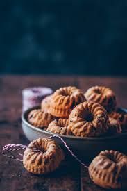 Bundt cakes are always welcome at parties and bake sales and with some mini bundt cake recipes, everybody can have a little cake to call their own. Mini Bundt Cakes With Oranges Chocolate Drops Cinnamon Klara S Life