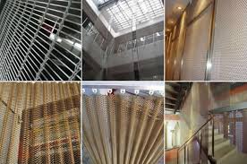According to the braided form of the fabric, horizontal metal bars are passed through vertical metal cables to form various patterns. Decorative Wire Mesh Curtains Ceilings Facade In Architecture Design