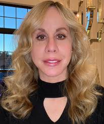 Can someone change my background to plain white for a passport photo?