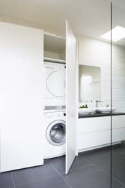 Create a practical laundry space in an awkward corner. 31 Creative Ways To Hide A Washing Machine In Your Home Digsdigs