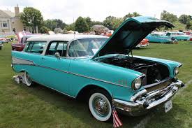 Front view of a red colored 1957 chevrolet. 1957 Chevy Color Chart Bambu
