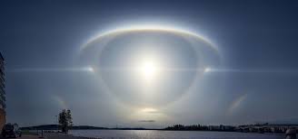 A rainbow encircled the sun last evening. Incredible Sun Halo Looks Like Eye In The Sky Strange Sounds Clouds Sky Atmospheric Phenomenon