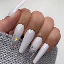 One of the accent nails is covered in sparkling crystals. 30 Bold And Unique Coffin Nails To Showcase Your Personality