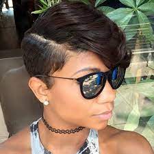 With small, delicate coils and shaved nape and sides, this light pink hairstyle for black women is one of the most feminine hairstyles and allows many personalization options. 60 Great Short Hairstyles For Black Women Short Hair Styles Side Part Hairstyles Womens Hairstyles