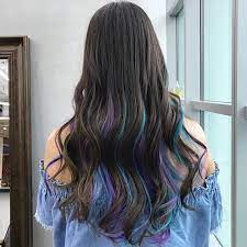 Vivid Candy Shades Peeking Through A Dark Natural Hair Colour Base Hidden Highlights Are The Newest Natural Hair Color Natural Hair Styles Hair Colour Design