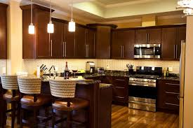 Cute Dark Brown Color Mahogany Wood Kitchen Cabinets Comes With Silver Color Long Shape Metal Cabin Mahogany Kitchen Dark Brown Kitchen Cabinets Tuscan Kitchen