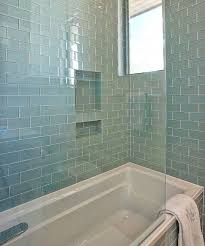 With so many colors, styles and materials to choose from, this guide of bathroom tile ideas makes it easy to narrow your choices and find the tile that fits your style and your budget. 12 Tricks To Make Your Small Bathroom Look Way Bigger Woman S World Glass Subway Tile Bathroom Bathroom Design Glass Bathroom