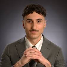 Kidney Stone Dissolution By Tetherless, Enzyme‐Loaded, Soft Magnetic  Miniature Robots