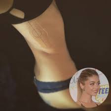 Good spots for a first tattoo that you can easily admire are the wrist, arm, foot, and hand. Sarah Hyland 5 Tattoos And Meanings Creeto