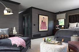 Contemporary gray and purple girl's bedroom features an accent wall clad in caitlin wilson blooms grande in grey wallpaper positioned behind a dove gray velvet headboard paired with a bed placed on a gray trellis rug and dressed in a gray border white bed skirt, a purple polka dot duvet, and a gold chevron lumbar pillow layered in front of black hearts pillow and purple border shams. Transitional Black And Purple Master Bedroom Hgtv Faces Of Design 2018 Hgtv