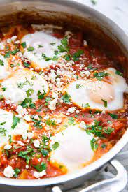 Shakshouka Poached Eggs In Spicy Tomato Sauce Love And Olive Oil Recipe Poached Eggs Easy Chicken Dinner Recipes Spicy Tomato Sauce