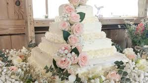 We wanted these for centerpieces, and the b. This Diy Costco Wedding Cake Hack With Trader Joe S Flowers Only Cost 50 Gma