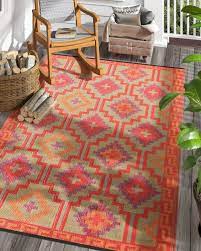 With an outdoor rug, you can go bolder, brighter, or more graphic in your yard, and you don't have to worry. 20 Stylish Outdoor Rugs That Will Make Your Patio Feel Extra Cozy Outdoor Rugs Patio Coral Outdoor Rug Outdoor Carpet