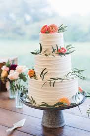 After the icing was hardened, the upper tiers became real. Three Tier Floral Decorated Carrot Cake Brides Summer Wedding Cakes Simple Wedding Cake Tiered Wedding Cake