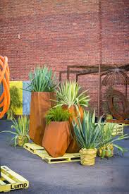 Long and sleek, the product is the perfect addition to any balcony, deck, or patio. Beautiful Corten Steel Planters Shaped And Inspired By Nature