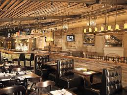 Get Cozy With Someone Special In Our Love Seat Booths Commercial Restaurant Design Reclaimed Wood Restaurant Restaurant Design