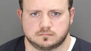 Fired Oakland County sheriff's deputy arraigned