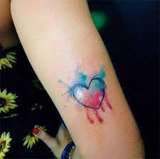 The heart is a symbol that is universally known, representing love and passion. Watercolor Tattoo Pink And Blue Heart Tattoo Colorful Heart Tattoo Design Tattooviral Com Your Number One Source For Daily Tattoo Designs Ideas Inspiration