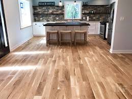 Old worn white oak floors get a makover with provincial stain to achieve a warm medium toned brown. What Color Should I Stain My Wood Floors