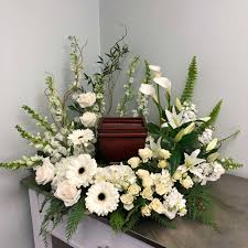 The right cremation urn can help ease the pain of. Evans White Garden Cremation Wreath In Peabody Ma Evans Flowers