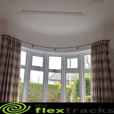 Large glass windows can be beautiful for any room, but they can also be a pain when it becomes time to choose window coverings for them. Curtain Tracks For Curved Windows Curtain Tracks Curved Windows