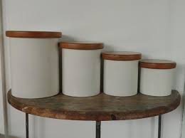 Maybe you would like to learn more about one of these? Vintage Mid Century Modern Set Of 4 White Copco Metal Canisters With Wood Lids By Modandozzie From Mod And Ozzie Of Annapolis Md Attic
