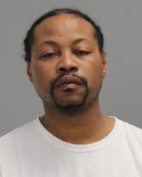 TENNELL, REGGIE was booked into the Brazos County Jail