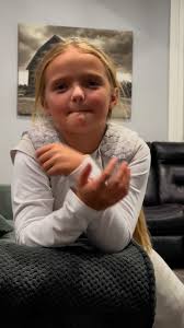 My 9yo reciting the preamble. This is a true American girl 💪🏻 she just  got done with football, that’s why she is in her pads lol