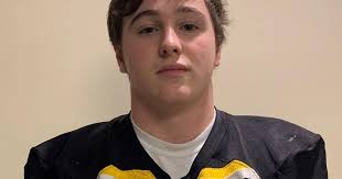 New London High School football senior Carter Allen enjoys the dirty work  in the trenches