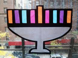 Using a sturdy paper plate as a base, punch six equidistant points around the edge, then string gold yarn through. 19 Hanukkah Crafts For Kids