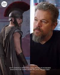 Matt Damon's mythical Odysseus beard 🧔✨ steals the spotlight in his promo  for Andre Sculz's Netflix comedy special. He's currently filming Nolan's  The Odyssey 🎬 in Morocco 🇲🇦. Legendary vibes—what do you