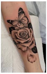 Three butterflies, that more than likely represent either three children or three family members. 20 Tiny Tattoos With Big Meanings 129286 Small Tattoos Smalltattoos Tattoos With Rose And Butterfly Tattoo Rose Tattoos For Women Butterfly Tattoo Meaning