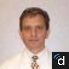 Dr. John W. Currens, MD