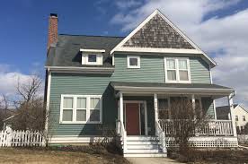 A blue house with white trim is an american classic. How To Use Green For Your House S Exterior