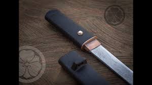 Once the refractory is dry, it needs to be cured. Tanto Blade Forging Crossed Heart Forge