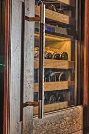 Wine refrigerators, wine cooling units, glasses & barware Attic Becomes Lofty Wine Cellar Kitchen Bath Design News