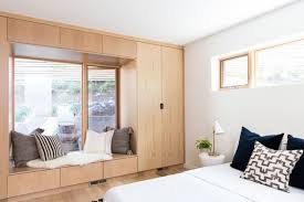 The cute upholstered furniture fits nicely by the window and by the wall while matching the area rug this bedroom has a seating area that is very similar to one that you would find in a hote. 16 Bay Window Ideas With Lots Of Storage Recommend My
