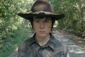 Carl continues most of his habits and is tended to by his siblings. The Walking Dead New Trailer For The Mid Season Premiere Video The Walking Dead Carl Grimes Walking Dead Season