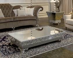 The furnishings of mirrors was in style through the 1920s and 1930s within the artwork. Mirrored Coffee Table Design Images Photos Pictures