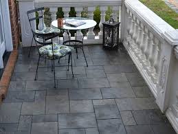 Decking boards is an instant way to upgrade any outdoor space and create an area for lounging and dining. Slate Patio Tiles Best Outdoor Flooring Ideas House Plans 114939