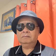 Michael Sene Bounleuth added a...