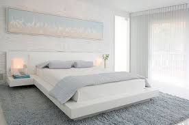 Though this room designed by robson rak looks formal and modern at first glance, the bed itself is cozy and inviting. Minimalist Bedroom Ideas Cool Interior Designs In White
