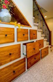12 Creative Ways To Use The Space Under Your Stairs Stair Storage Understairs Storage Home Remodeling