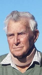 Removing neck collar from photo for funeral service