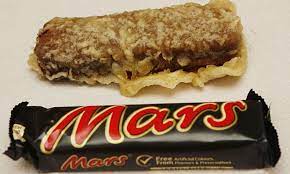A Deep Fried Mars Bar Only In Scotland It Is The Greatest Dessert After My Fish And Chips Deep Fried Mars Bars Food Scottish Cuisine