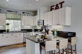 Black Pearl Granite Countertops With White Cabinets Kitchen Remodel Countertops Replacing Kitchen Countertops Countertop Design