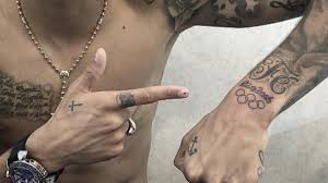 Neymar is also a soccer player before flying from brazil to barcelona, neymar had added two more tattoos on the left and right. Neymar Gets New Tattoo To Celebrate Brazil S Gold Medal At Rio Olympics Cbssports Com